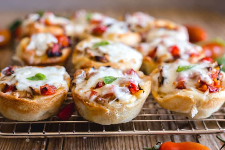 pizza muffins on a wire rack